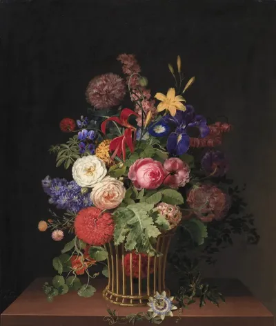 En Let Rorkurv Med Blomster