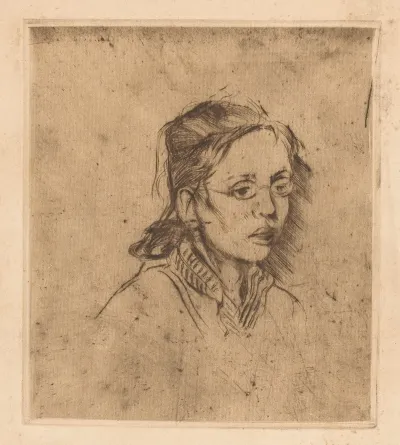 Face Of A Young Woman With Glasses