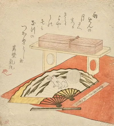Fan Painting Of Rabbit And Moon On A Red Felt Blanket