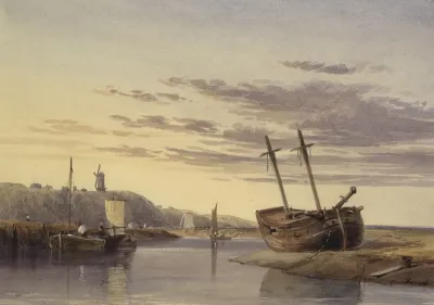 Fishing Boats In Rye Harbour With A Windmill In The Distance