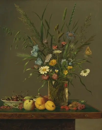 Flowers In A Glass Vase And An Arrangement Of Fruit