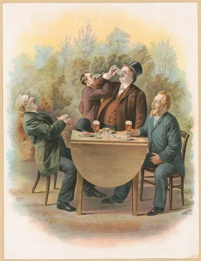 Four Gentlemen Sitting At A Table In The Outdoors Enjoying Food And Drinks