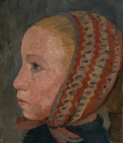 Girls Head With A Striped Cap In Profile To The Left