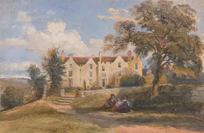 Group Seated In Grounds Of A Large House