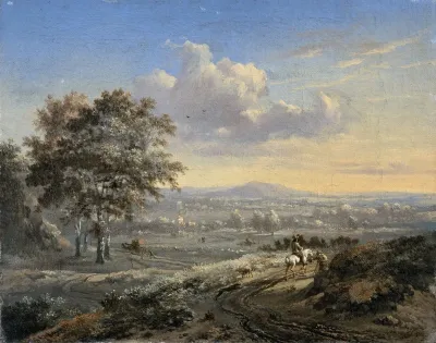 Hilly Landscape With A Rider On A Country Road