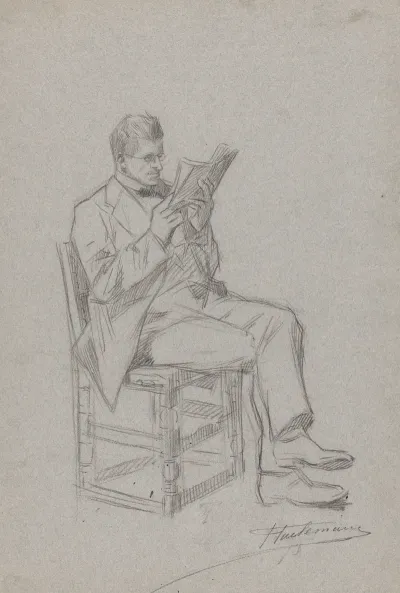 Homme Lisant Assis Sur Une Chaise