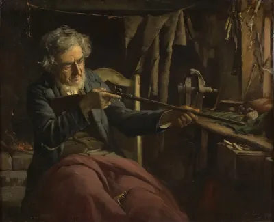 Homme Reparant Un Fusil