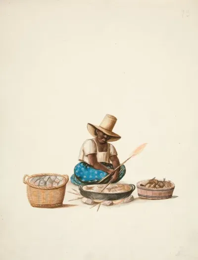 Indian Woman Cooking Fish