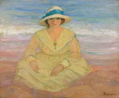 Jeune Fille Assise Sur La Plage