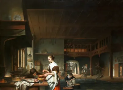 Kitchen Interior With A Woman Cooking