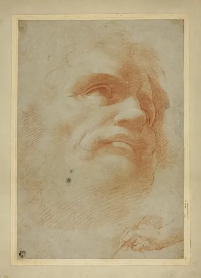 Male Head And Sketch Of Right Hand Holding Stylus