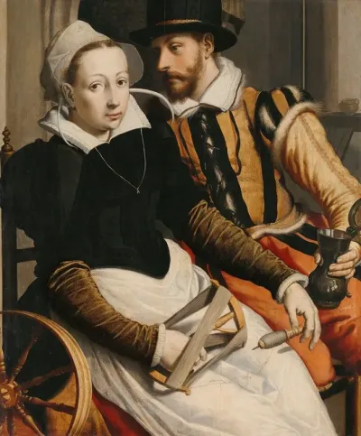 Man And Woman At A Spinning Wheel