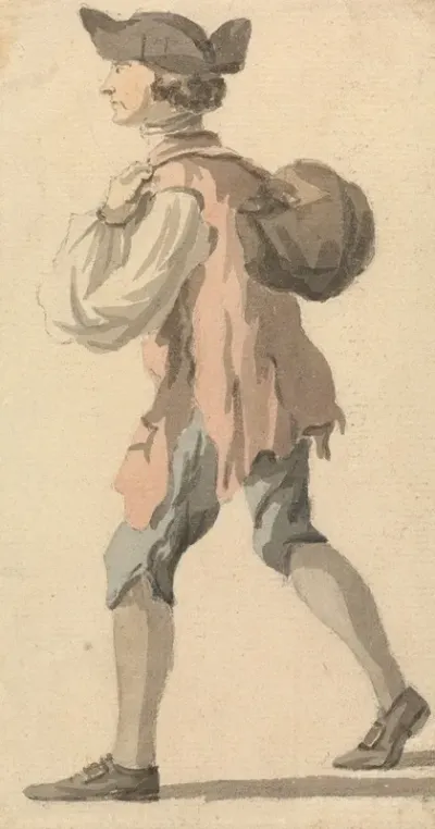Man Carrying Bundle On His Back