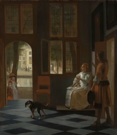 Man Handing A Letter To A Woman In The Entrance Hall Of A House