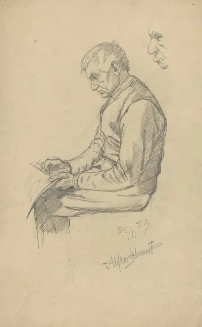 Man Sitting And Reading A Book