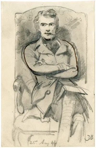 Man Sitting In A Chair A Book In His Lap