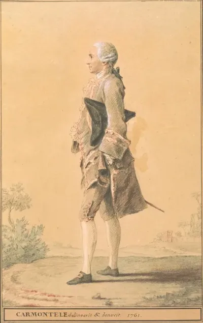 Man Standing With Hat Under Arm