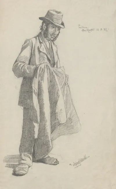 Man Wearing A Hat Holds A Jacket In His Hands
