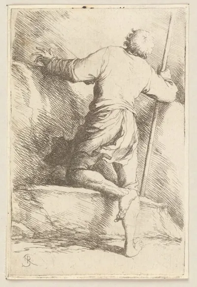 Man With Staff Seen From Behind