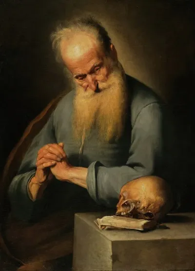 Old Man In Prayer Contemplating A Skull