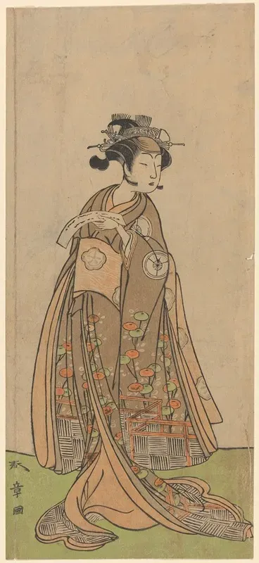 One Of The Segawas Holding A Letter