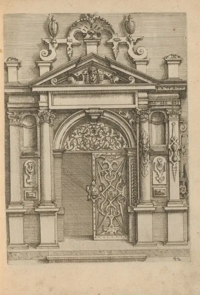 Portal With Iron Railing And Decorated With Mascarons And Scrollwork