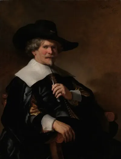 Portrait Of A Man Seated In An Armchair