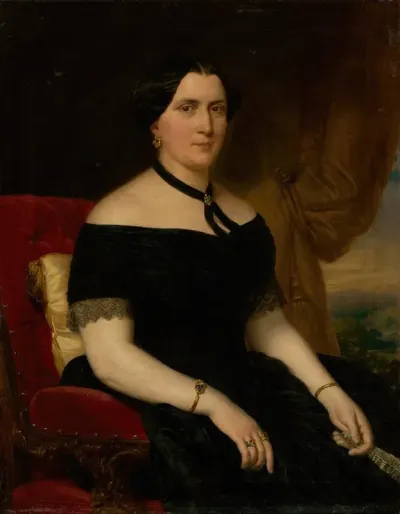 Portrait Of A Woman In A Velvet Armchair