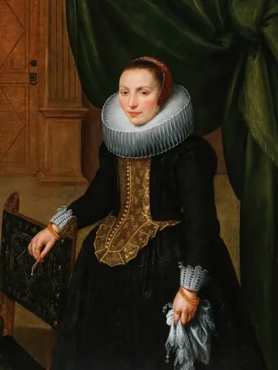 Portrait Of An Elegant Lady Standing By A Chair