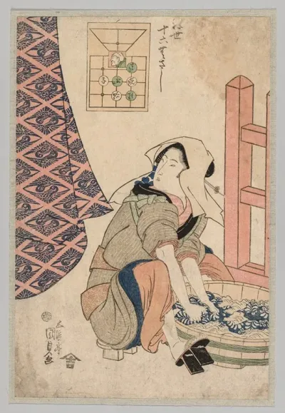 Seated Woman Washing Clothes In A Wooden Tub
