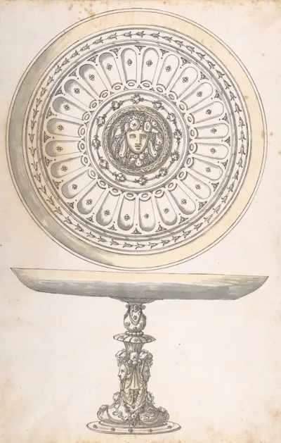 Shallow Round Dish On Tall Pedestal Decorated With Fruit And Female Masks