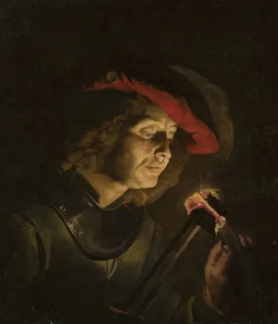 Soldier Lighting A Candle