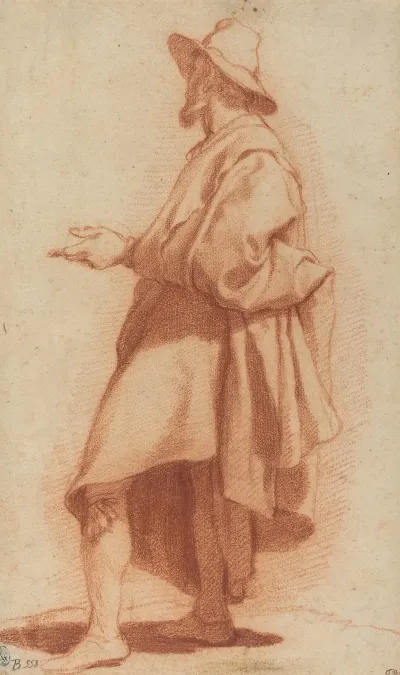 Standing Man Wearing A Cloak And Hat