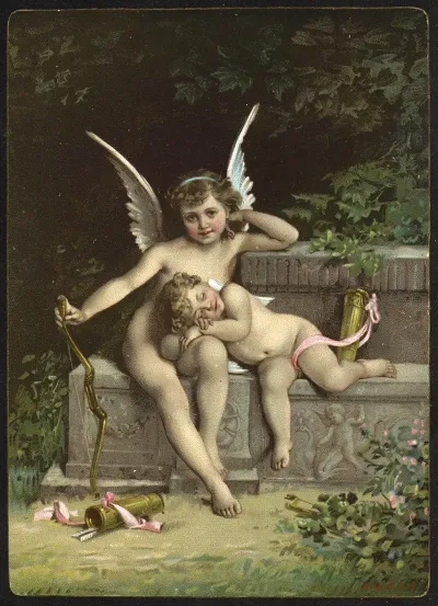 Two Cupid Figures Sitting On A Bench