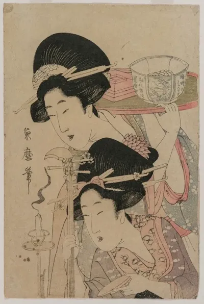 Two Geishas Beside A Candle