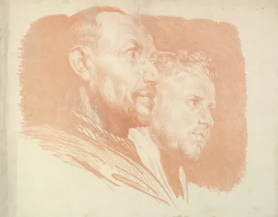 Two Male Heads In Profile To Right