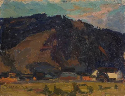 View Of A Village Against The Background Of A Mountain