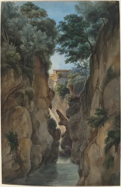 View Of A Waterfall Through A Ravine