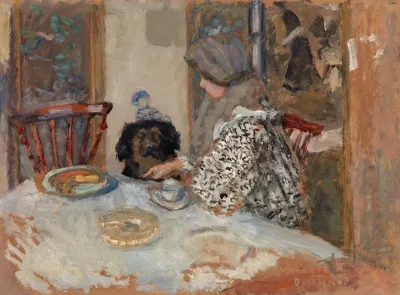 Woman And Dog At Table