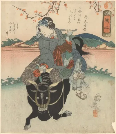 Woman Riding On The Back Of A Bull