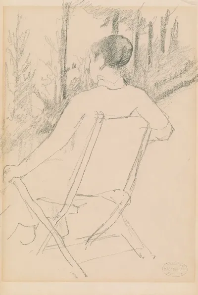 Woman Seated In A Folding Chair In A Garden
