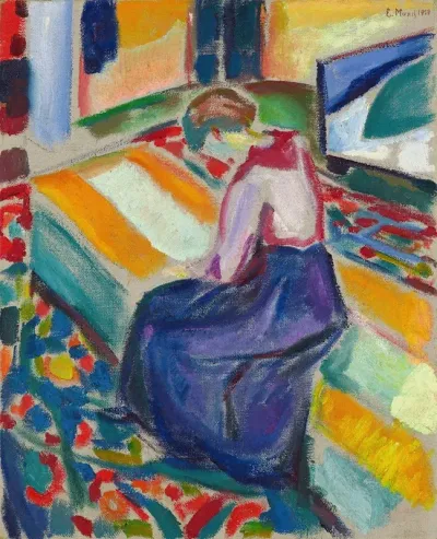 Woman Seated On A Couch
