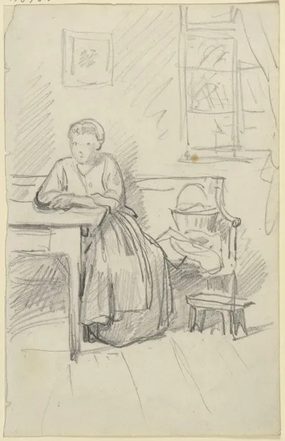 Woman Sitting At A Table