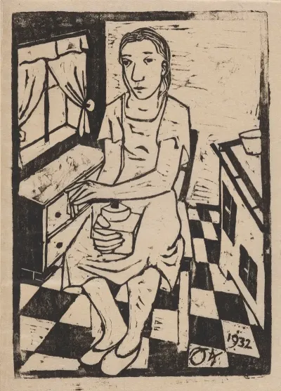 Woman Sitting On A Kitchen Chair Holding A Coffee Grinder