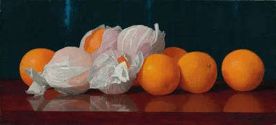 Wrapped Oranges On A Tabletop
