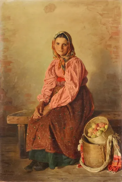 Young Farmer With A Basket Of Apples