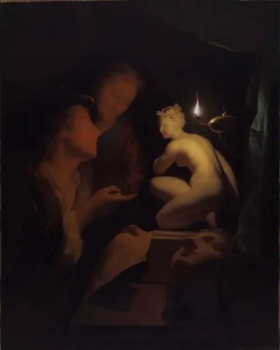 Young Man And Woman Studying A Statue Of Venus By Lamplight