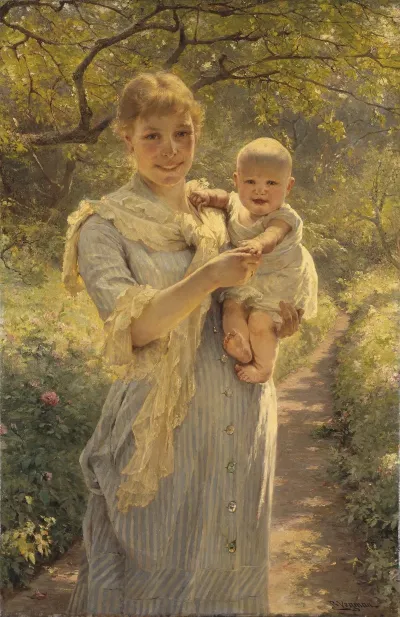 Young Mother With A Child In A Garden