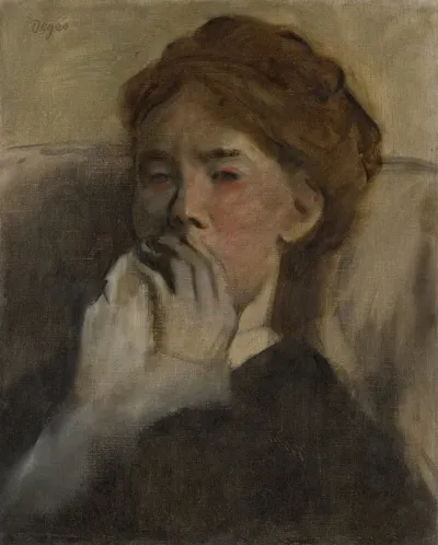 Young Woman With Her Hand Over Her Mouth