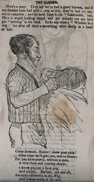 A barber cutting a man's hair